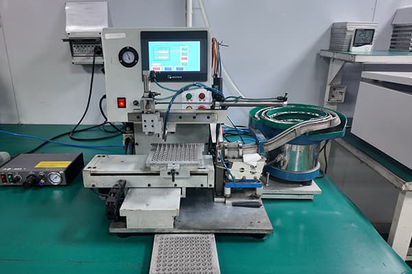 Automated connector assembly equipment on the production floor