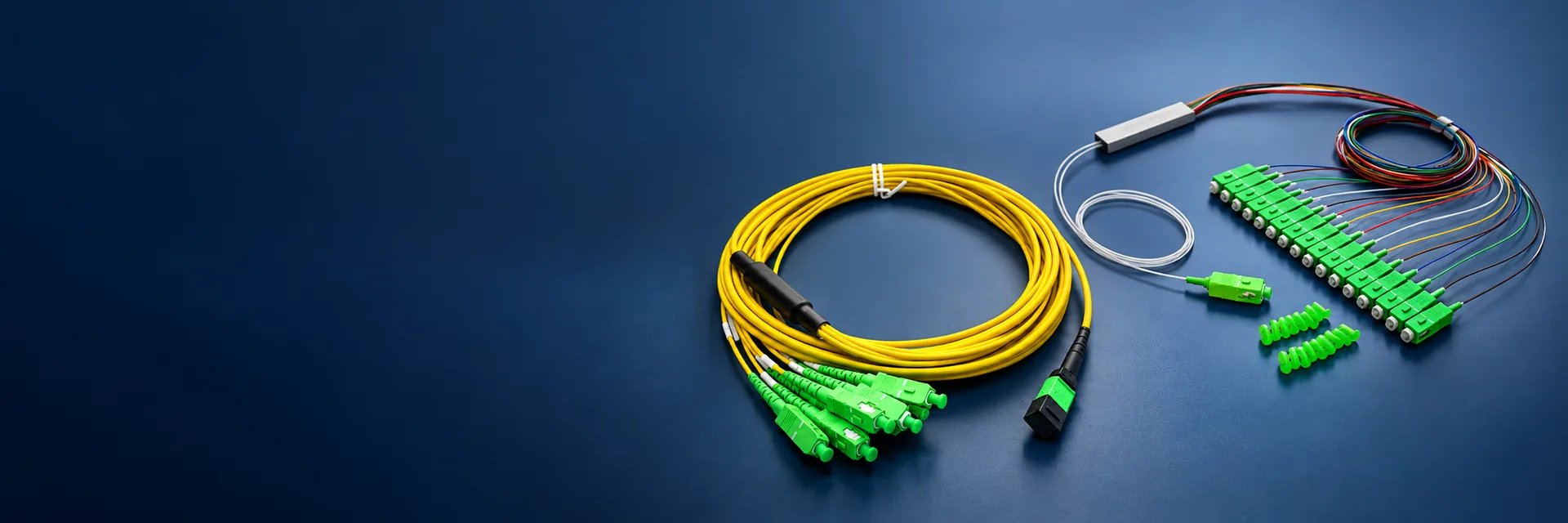 Fiber optic connectivity components on a dark blue background