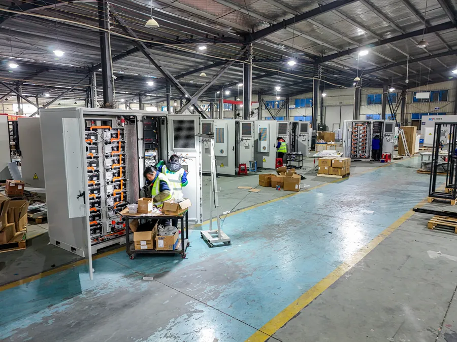 Open cabinets and equipment assembly stations in the factory workshop